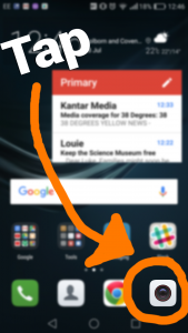 Arrow pointing to camera app icon on phone screen.