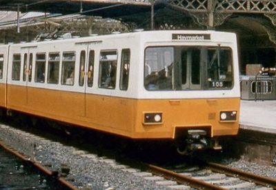 Tynemouth_station__with_Metro_train__1980__geograph-5317028-by-Walter-Dendy_-deceased