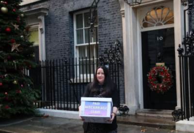 Photo of an MP outside parliament