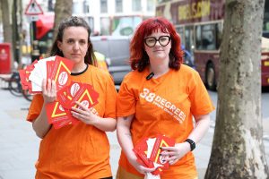 38 Degrees staff delivering the postcards