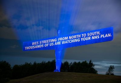Projected onto the Angel of the North: "Wes Streeting: from North to South: thousands of us are watching your NHS plan"