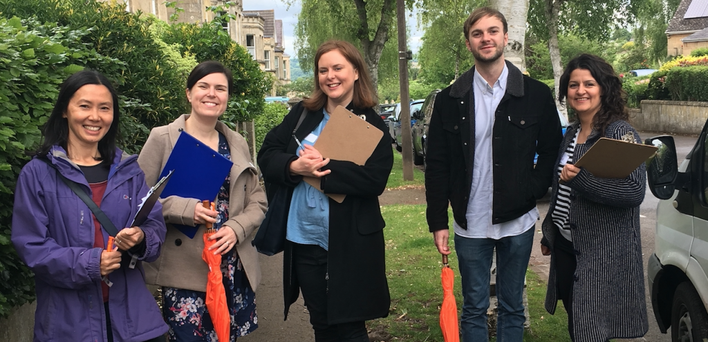 38 Degrees members smile on the street in a canvassing session