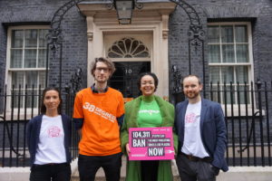 A group of campaigns from City to Sea, 38 Degrees, and Greenpeace, standing outside 10 Downing Street with a petition.
